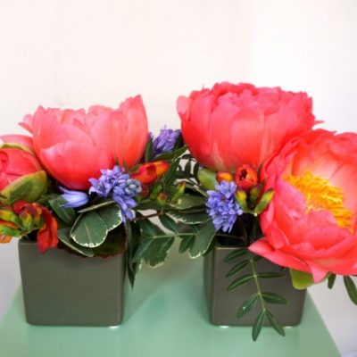 Composizione in mini cubi Maria Luisa Rocchi Flowers. a domicilio con cosaporto.