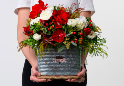centrotavola fiori rossi frida a domicilio con cosaporto