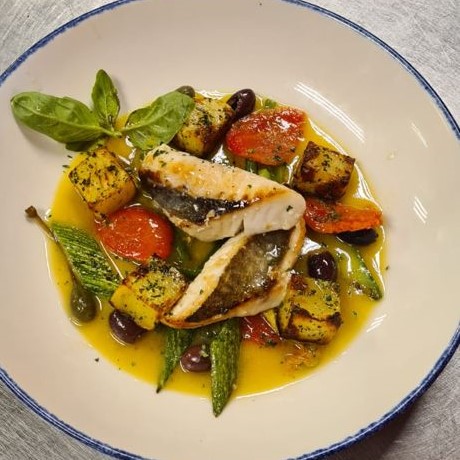 Branzino in guazzetto alla vernaccia Osteria del Mare consegna a domicilio con Cosaporto