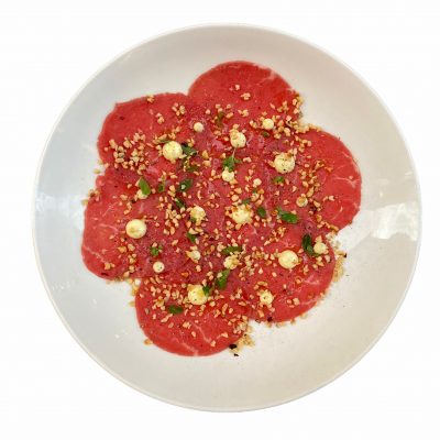 Carpaccio di manzo, maionese, nocciole e maggiorana Enoteca Marcucci consegna a domicilio con Cosaporto