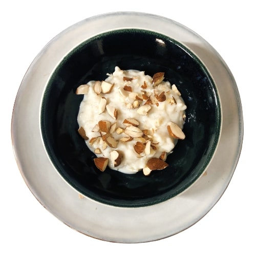 Risolatte al Cardamomo Verde con uvetta e mandorle Contrada Govinda consegna a domicilio con Cosaporto